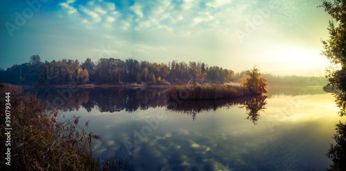 Autumn Sunrise Mirrored in Shallow Water photo