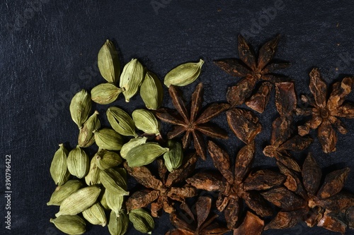 Star Anise (Chakra Phul)  and Cardamom closeup photos.Indian spices. photo