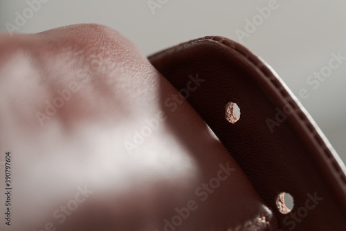 Closeup detail shot of brown leather sneaker photo