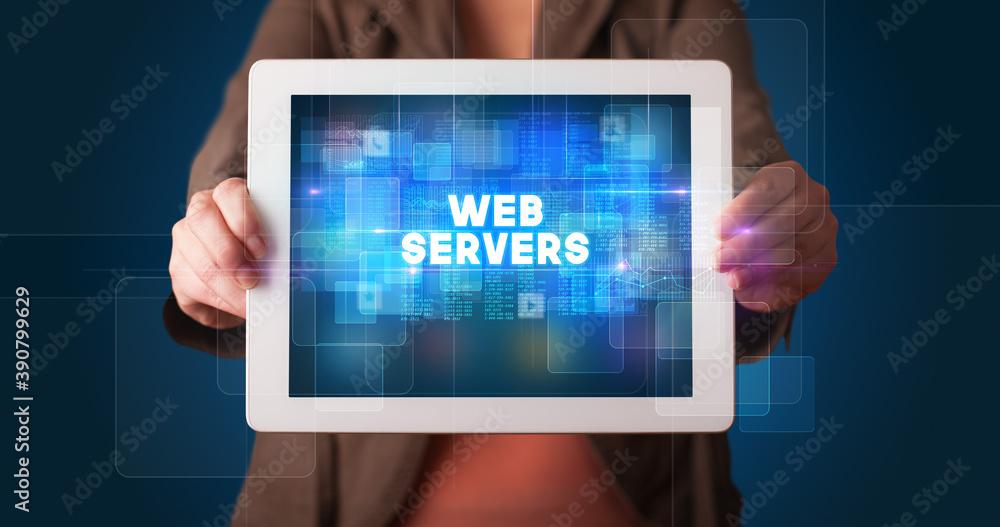 Young business person working on tablet and shows the inscription: WEB SERVERS Young business person working on tablet and shows the inscription: WEB SERVERS