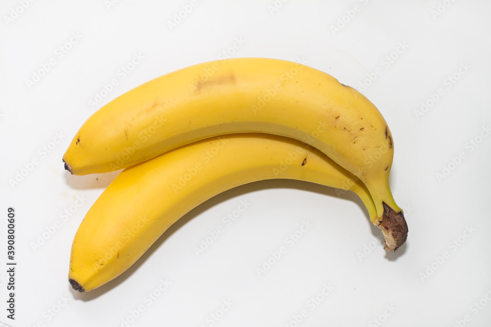 bananas on yellow background bananas on yellow background