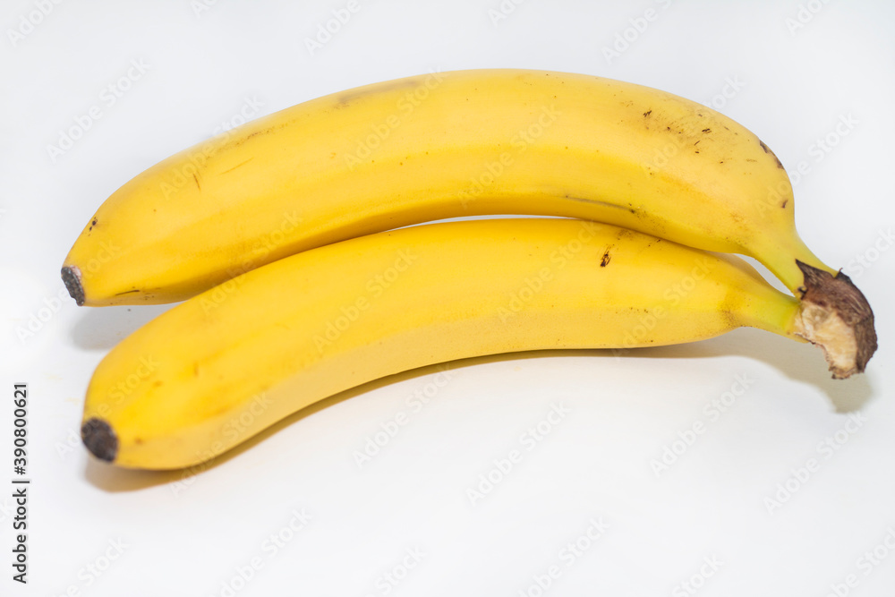 bananas on yellow background bananas on yellow background