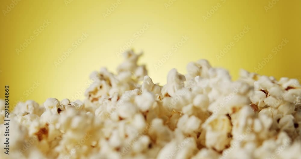 delicious popcorn on a rotating background delicious popcorn on a rotating background