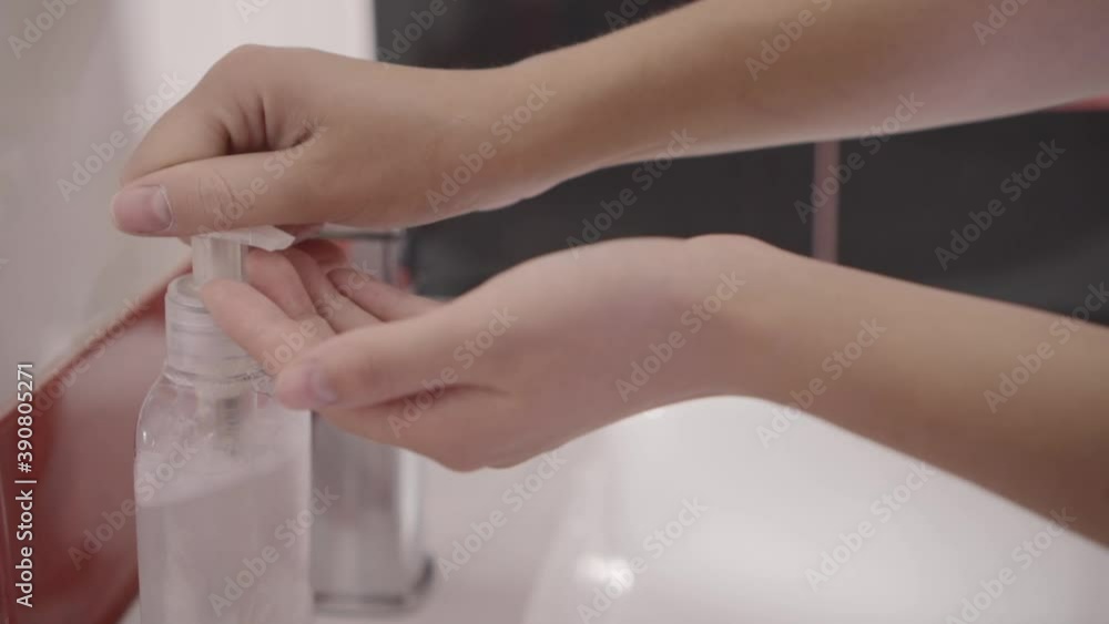 Woman uses sanitizer to protect herself from bacteria and viruses. Antibacterial protection and hygiene concept. Woman uses sanitizer to protect herself from bacteria and viruses. Antibacterial protection and hygiene concept.