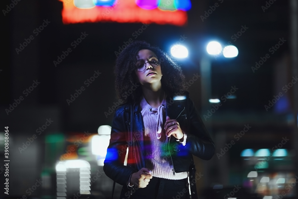 Night portrait of beautiful fashion young african american girl Night portrait of beautiful fashion young african american girl