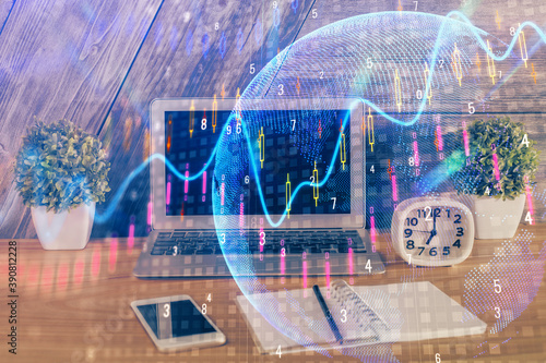Double exposure of forex graph and work space with computer. Concept of international online trading. © peshkova