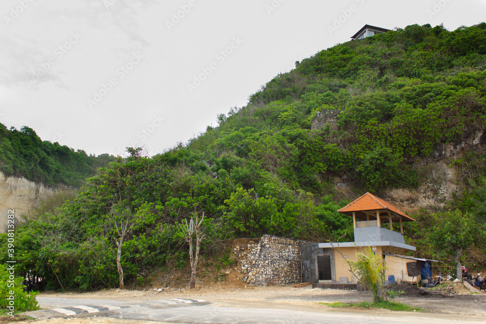 High green hill located near the beach High green hill located near the beach