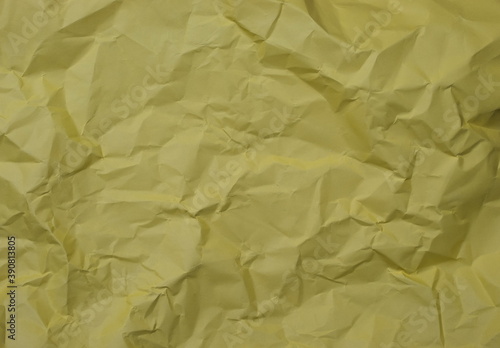 Crumpled yellow color background texture