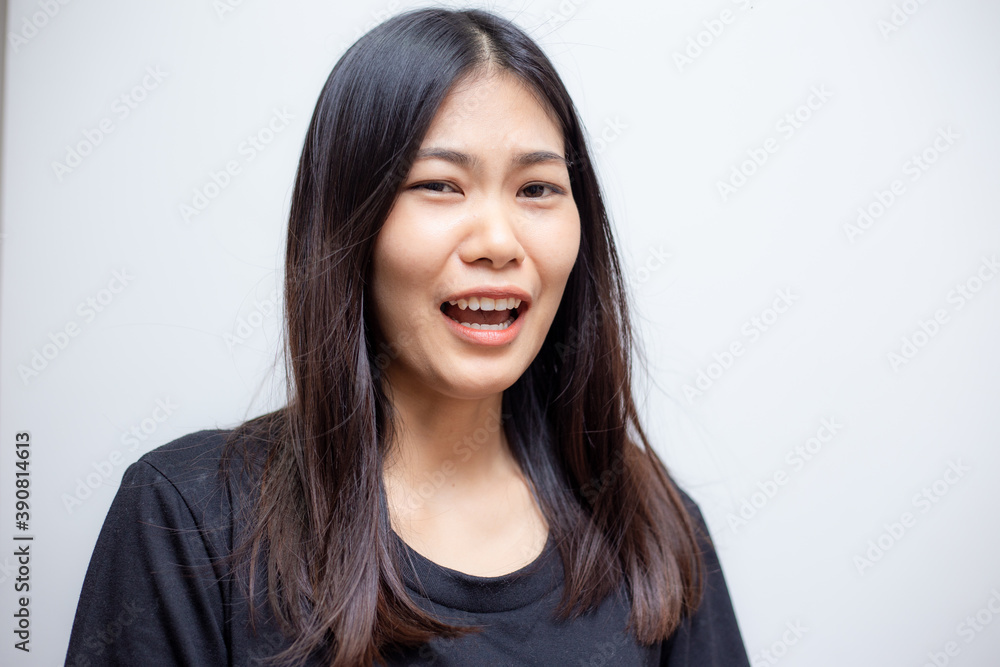 Young beautiful asian female posing with black t-shirt. Young beautiful asian female posing with black t-shirt.