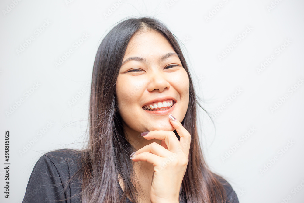 Young beautiful asian female posing with black t-shirt. Young beautiful asian female posing with black t-shirt.