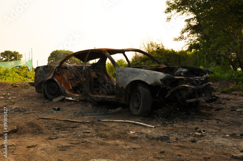 Rusted and burnt out car that has been abandoned. Vladivostok  Russia.