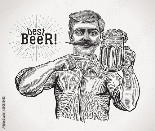 Man with a beer mug in one hand, pointing with the finger of the other hand at the mug.