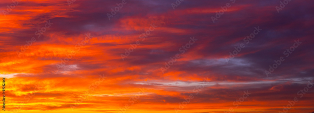 red clouds in the sky at sunset