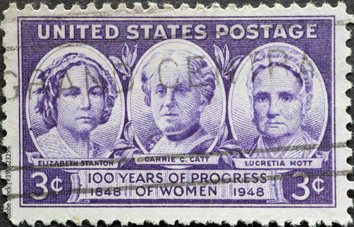 USA - Circa 1948 : a postage stamp printed in the US showing the woman Elizabeth Stanton, Carrie C. Catt, and Lucretia Mott. 100 Years of Progress of Women photo