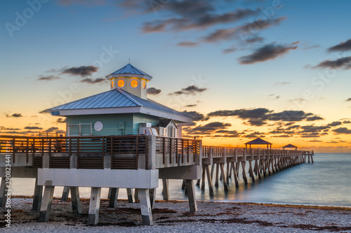 Juno, Florida, USA at the Juno Beach Pier just before sunrise.