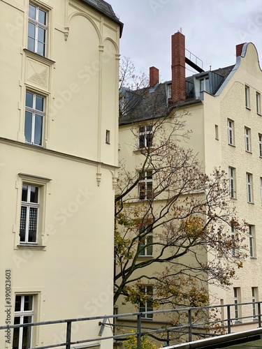 Canvas Print old buildings in berlin with trees