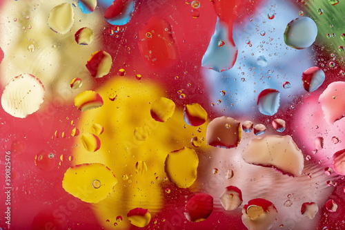 Oil and water drops. Abstract colorful modern background with glass