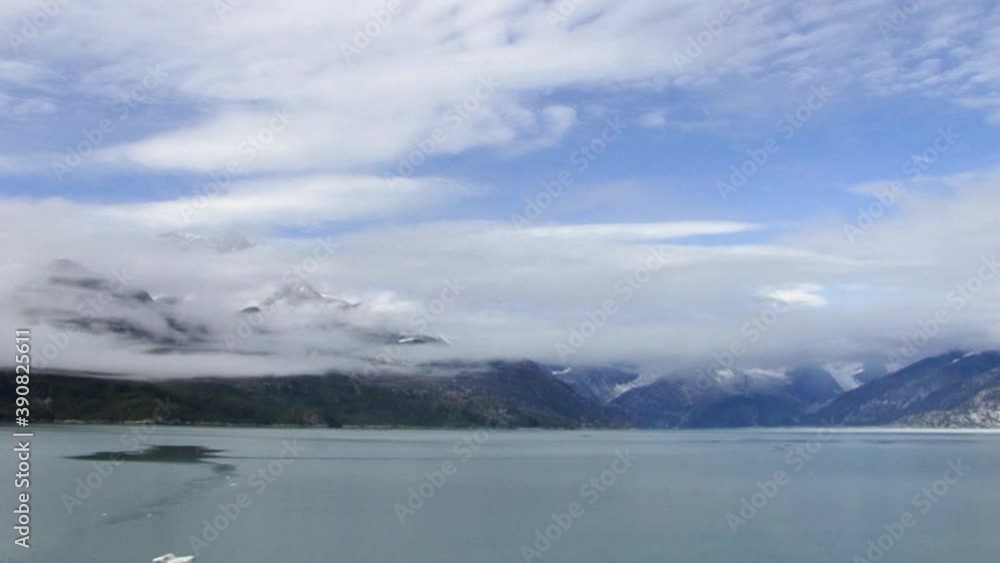 Low clouds on top of the mountains in Glacier Bay National Park, Alaska. Low clouds on top of the mountains in Glacier Bay National Park, Alaska.