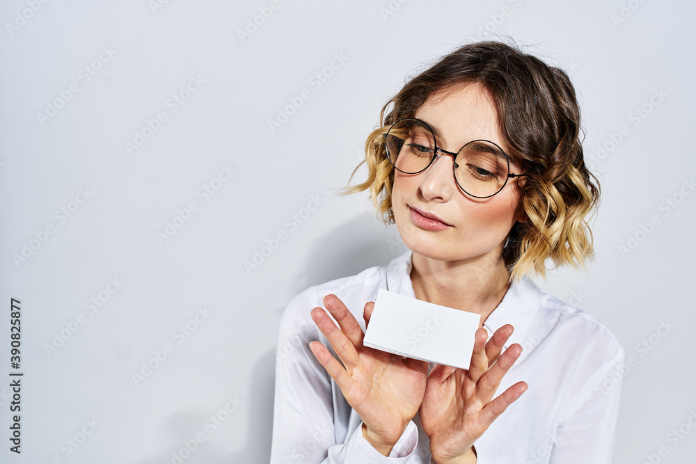 Business woman with card in hand light background credit card mockup Business woman with card in hand light background credit card mockup