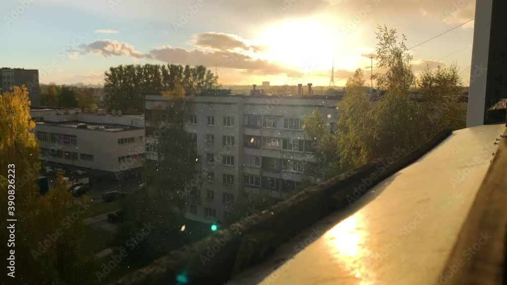 Sunny view with showering rain and hail during sunrise Sunny view with showering rain and hail during sunrise
