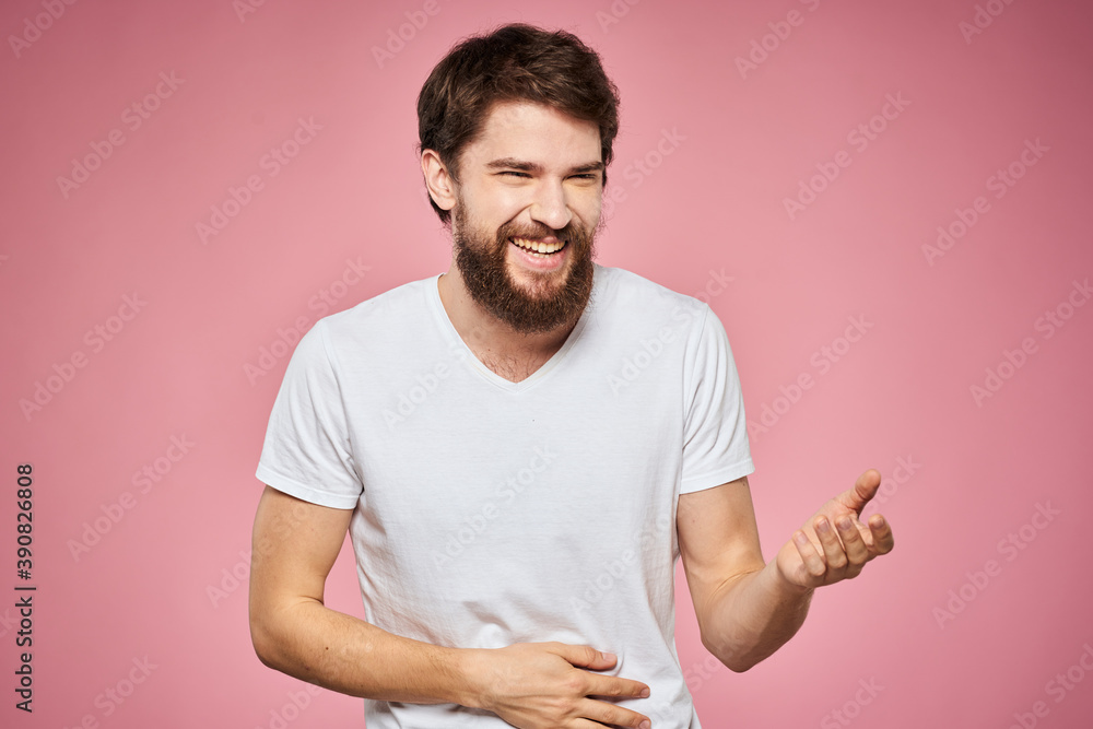 cheerful bearded man white t-shirt emotions cropped view pink background cheerful bearded man white t-shirt emotions cropped view pink background
