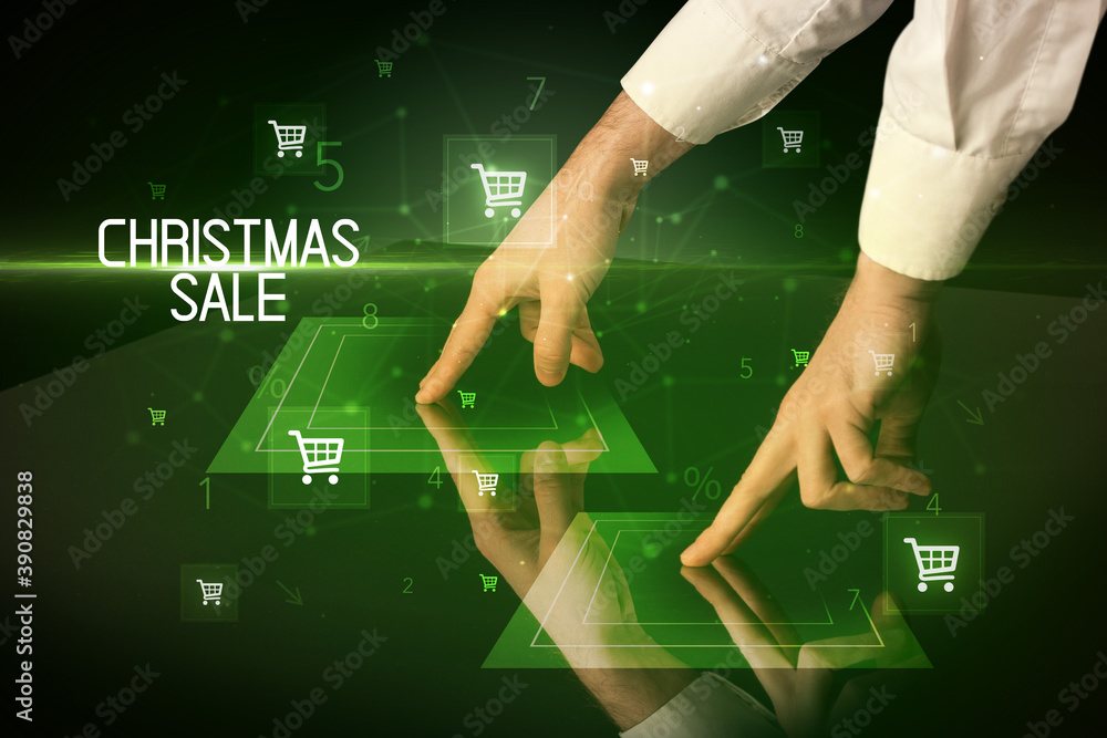 Online shopping with CHRISTMAS SALE inscription concept, with shopping cart icons Online shopping with CHRISTMAS SALE inscription concept, with shopping cart icons