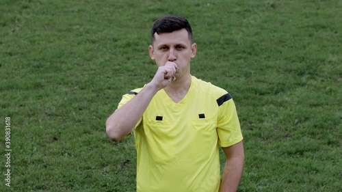 Referee goes watching VAR or violation of the rules. Concept of sport, rules violation, offside
