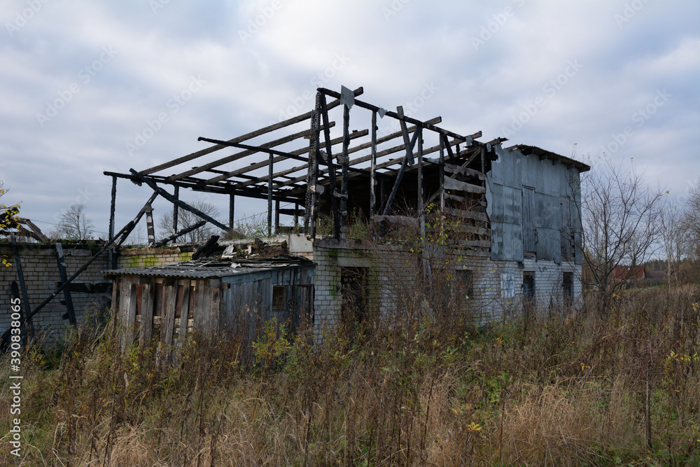 burnt house on the field.