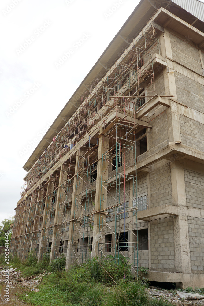 A new building not finished, construction site. A new building not finished, construction site.