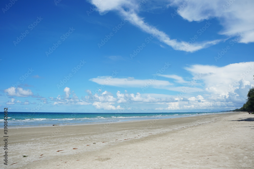 Beach with clear blue skies at Rayong Beach at Rayong Beach, Thailand.