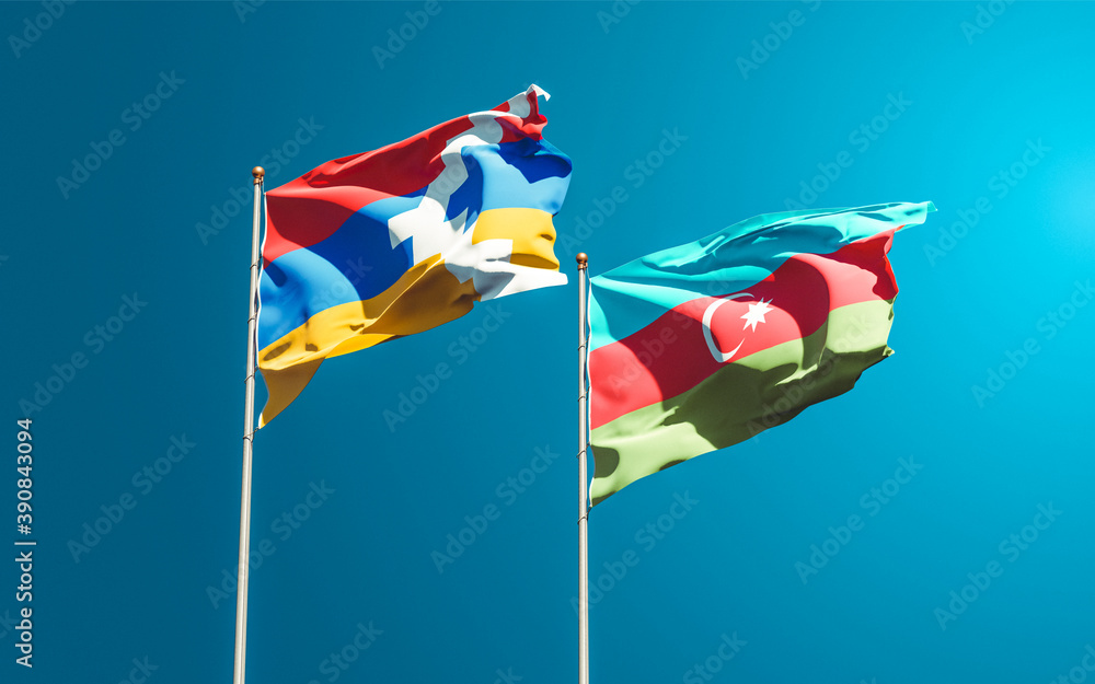 Beautiful national state flags of Azerbaijan and Artsakh together at the sky background. 3D artwork concept.