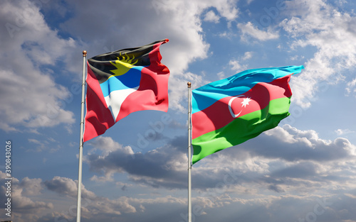 Beautiful national state flags of Azerbaijan and Antigua and Barbuda together at the sky background. 3D artwork concept. © Leo Altman