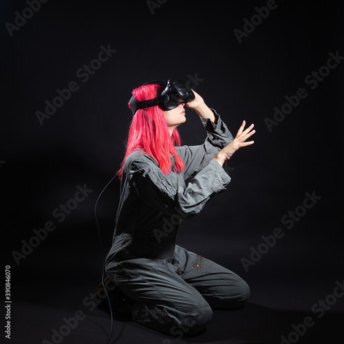 Virtual reality and futurism. Cyber punk concept, a gamer with pink hair.