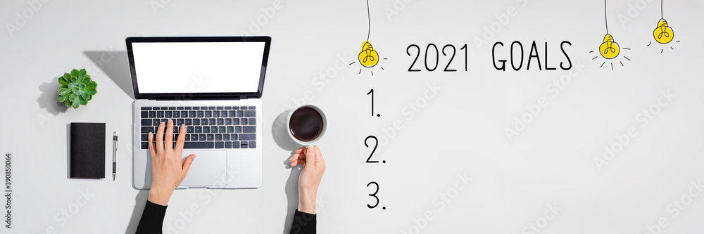 2021 goals with person using a laptop computer 2021 goals with person using a laptop computer