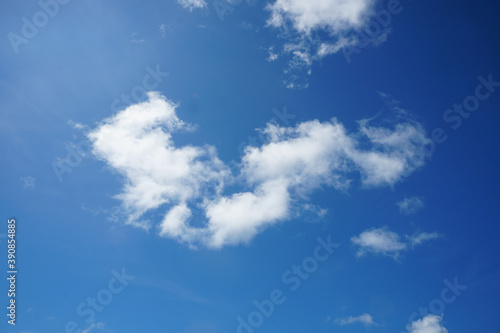 Cirrocumulus clouds on blue sky background.