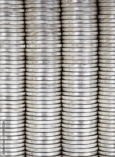 coins of silver color stacked together