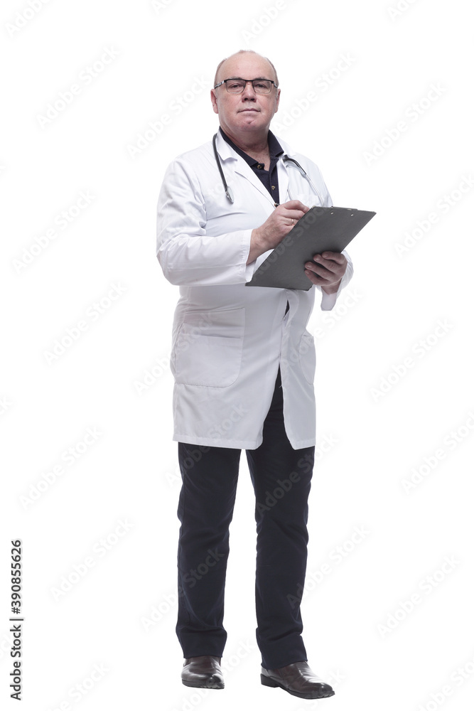 in full growth. serious doctor taking notes in the clipboard in full growth. serious doctor taking notes in the clipboard