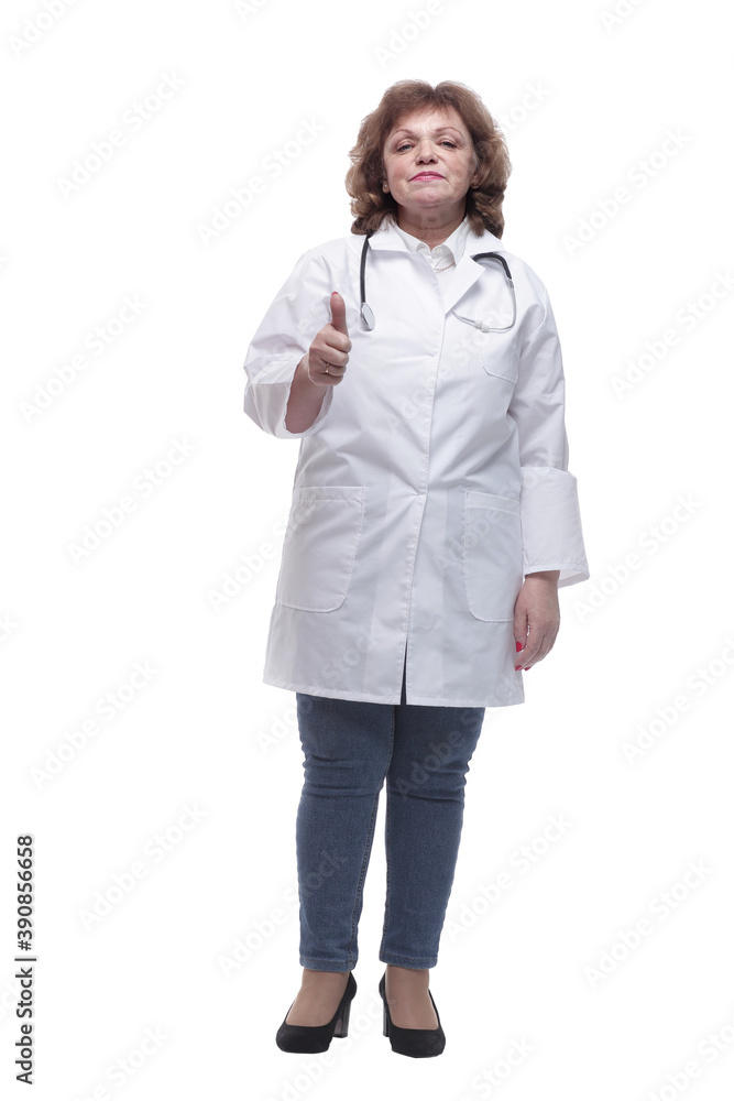 in full growth. qualified female doctor with a stethoscope in full growth. qualified female doctor with a stethoscope