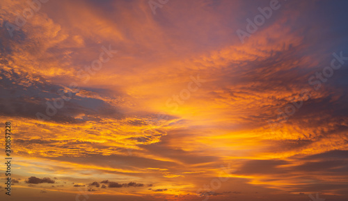 Abstract amazing Scene of stuning Colorful sunset with Moving clouds background in nature and travel concept, wide angle shot Panorama shot. © boophuket