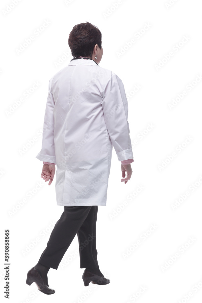 side view. medical woman confidently striding forward side view. medical woman confidently striding forward