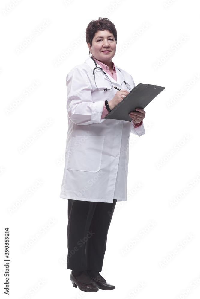 in full growth. smiling therapist with a clipboard in full growth. smiling therapist with a clipboard