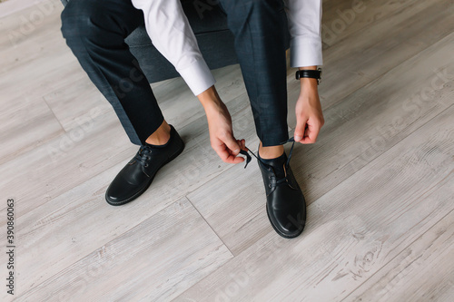 Men's leather shoes on the groom