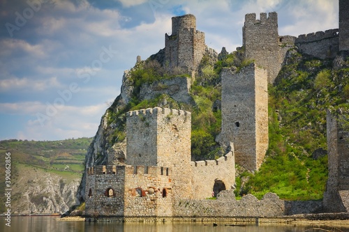 The Golubac Fortress against blue sky on the bank of Danube river in summer in Djerdap National Park  Serbia.