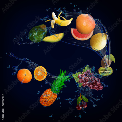 Fototapeta Naklejka Na Ścianę i Meble -  Panorama with fruits in splashes of water - juicy grapefruit, grapes, kiwi, orange, pineapple, banana, pear, avocado are full of vitamins and are very beneficial for our health