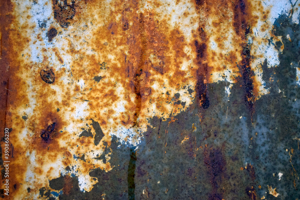 Old rusty metal texture with peeled paint.