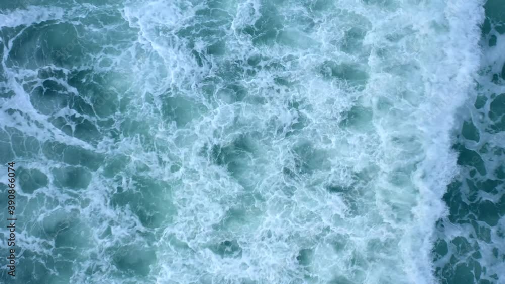 Aerial view of the waves of the Pacific Ocean. Seascape. Beautiful blue sea. Calming natural background. Aerial view of the waves of the Pacific Ocean. Seascape. Beautiful blue sea. Calming natural background.