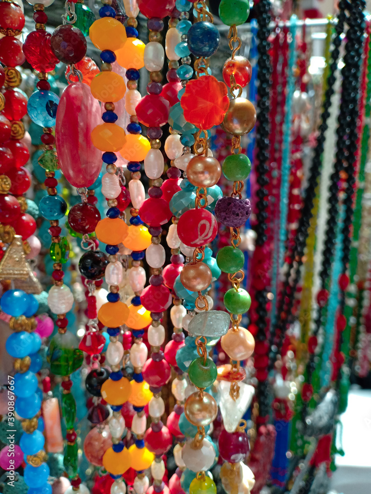 Colorful handmade traditional ethnic jewelry at indonesian market. Bracelet,necklace and other arts crafts