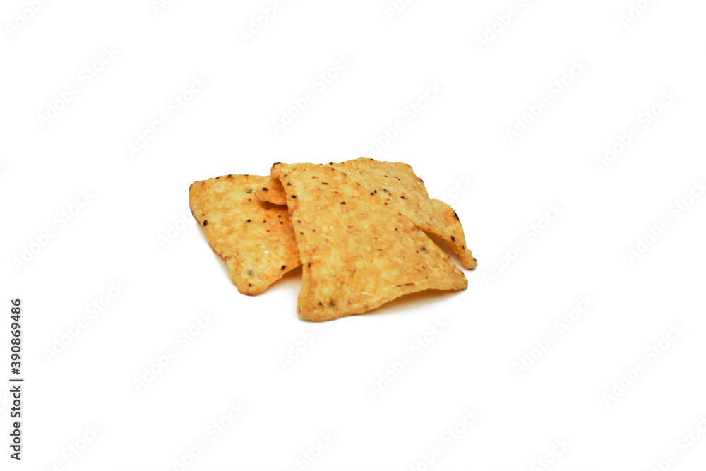 Corn chips on a white background. Quick snack. Corn chips on a white background. Quick snack.