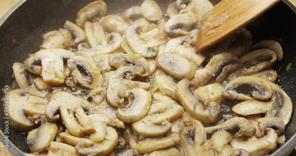 Cooking Mushrooms on a Frying Pan and Seasoning with Black Pepper Shot on Red Camera
Cooking Mushrooms on a Frying Pan and Seasoning with Black Pepper Shot on Red Camera