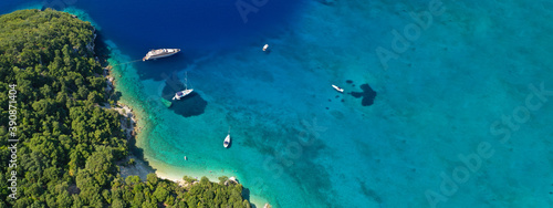 Fototapeta Naklejka Na Ścianę i Meble -  Aerial drone ultra wide panoramic photo of tropical exotic emerald sea wit turquoise crystal clear waters in asian destination island